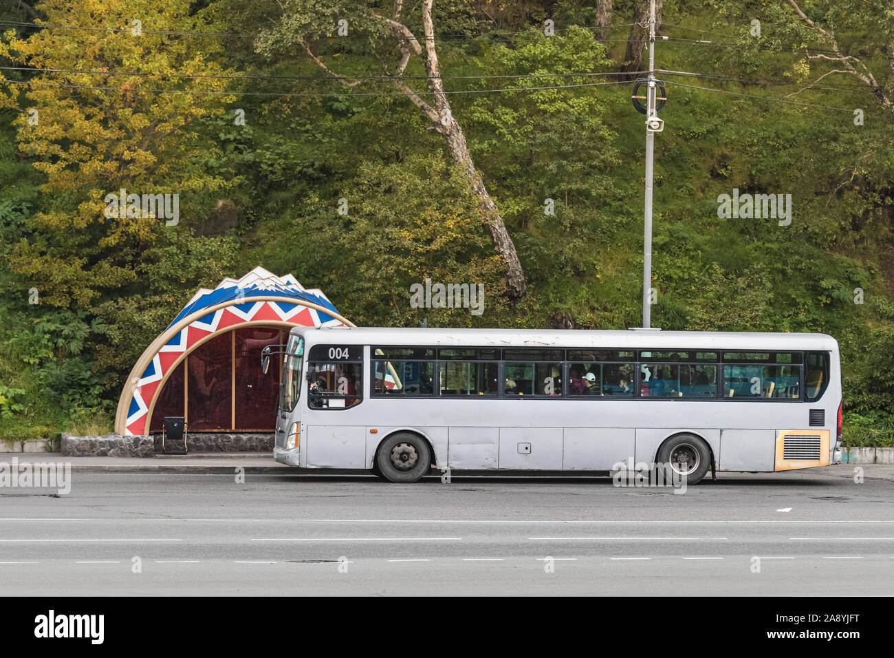A public transport bus stopped on a bus strop in Petropavlovsk-Kamchatsky, Russia. Stock Photo