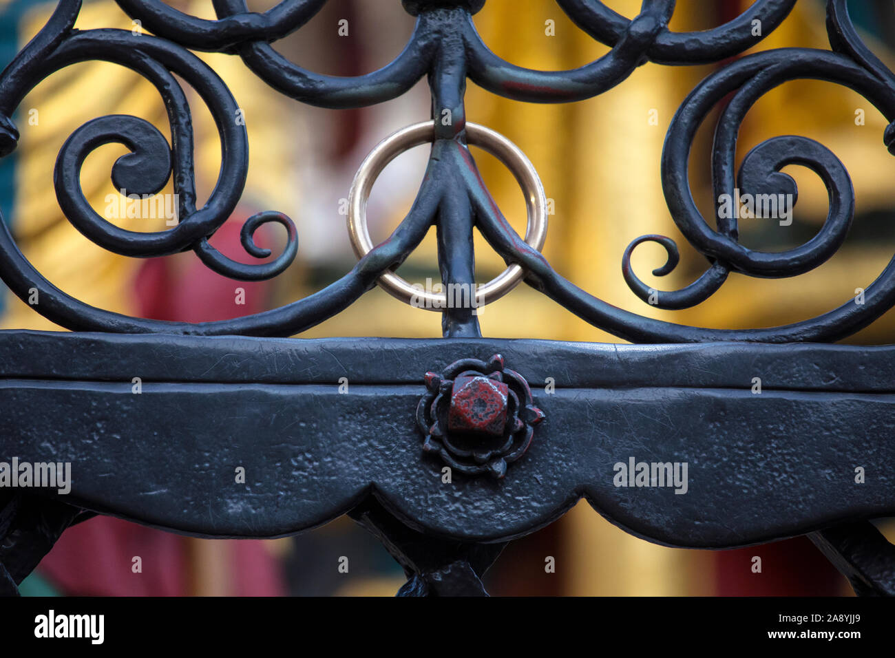 Close-up of the gold ring within the latticework of the Schoner Brunnen, or  Beautiful Fountain in Nuremberg, Germany. It is a tradition to turn the go  Stock Photo - Alamy