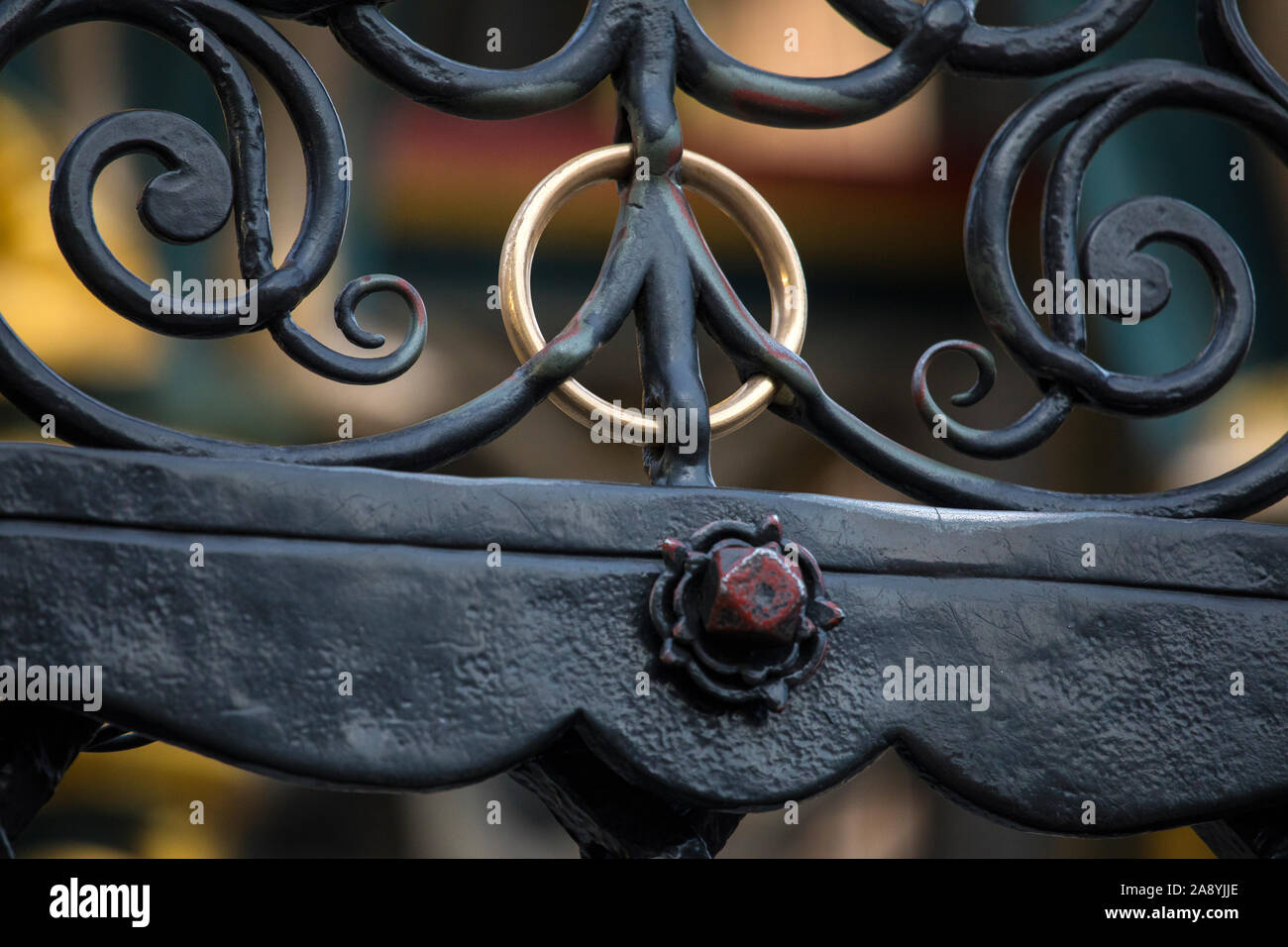 Close-up of the gold ring within the latticework of the Schoner Brunnen, or  Beautiful Fountain in Nuremberg, Germany. It is a tradition to turn the go  Stock Photo - Alamy