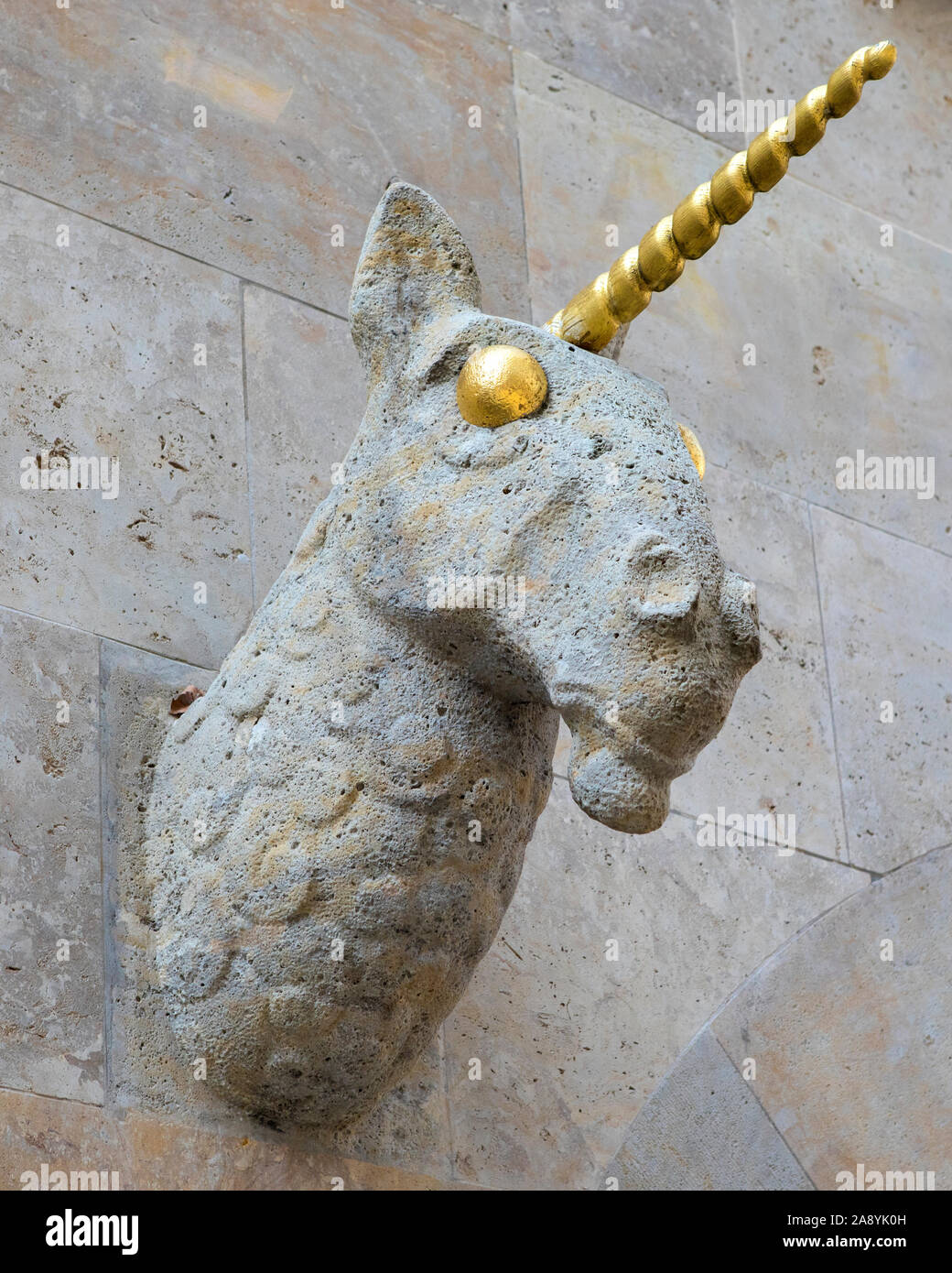 A Unicorn head sculpture on the exterior of a building in the Bavarian
