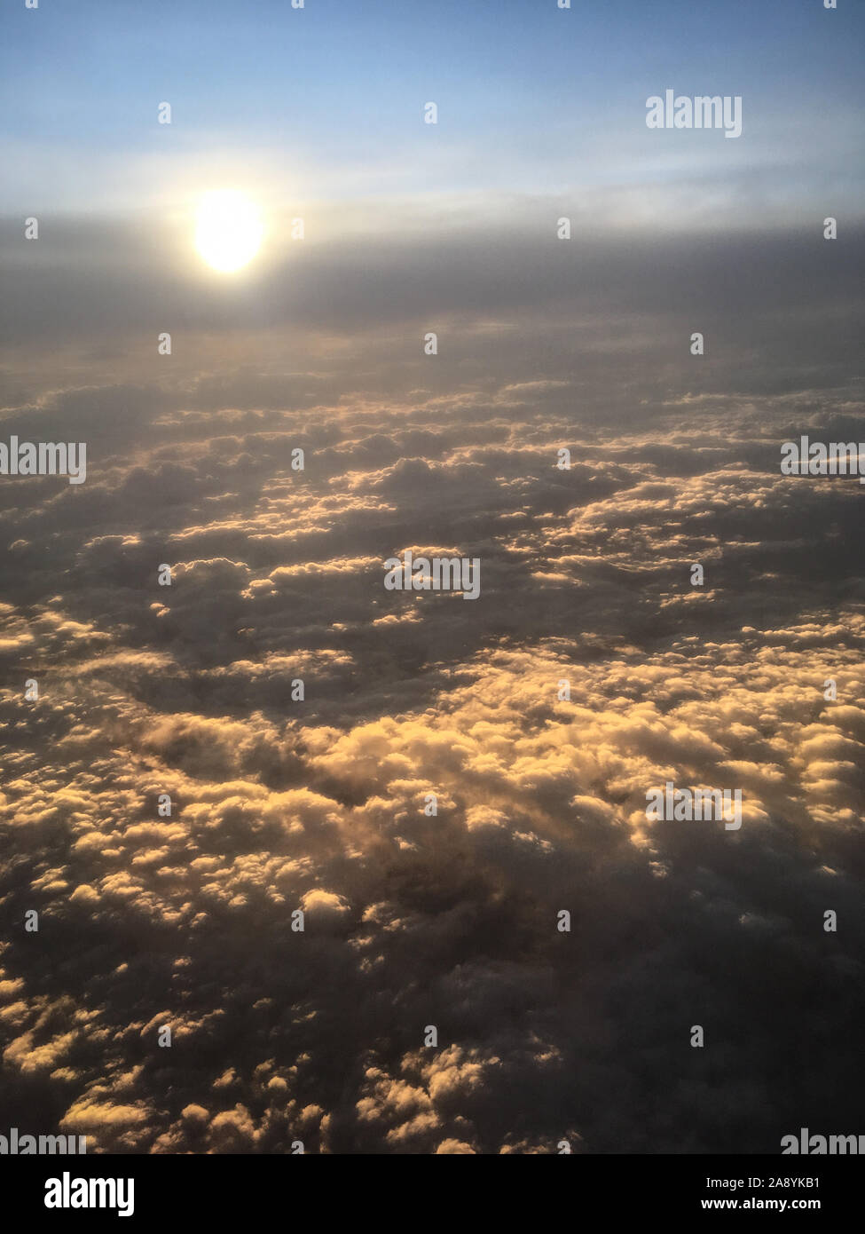 Watching the sun setting over Spain from our Airbus A320 window Stock Photo