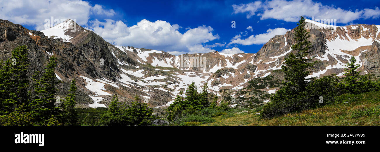 Colorado Rocky Mountains Indian Peaks Wilderness panorama alpine landscape with snow in summer