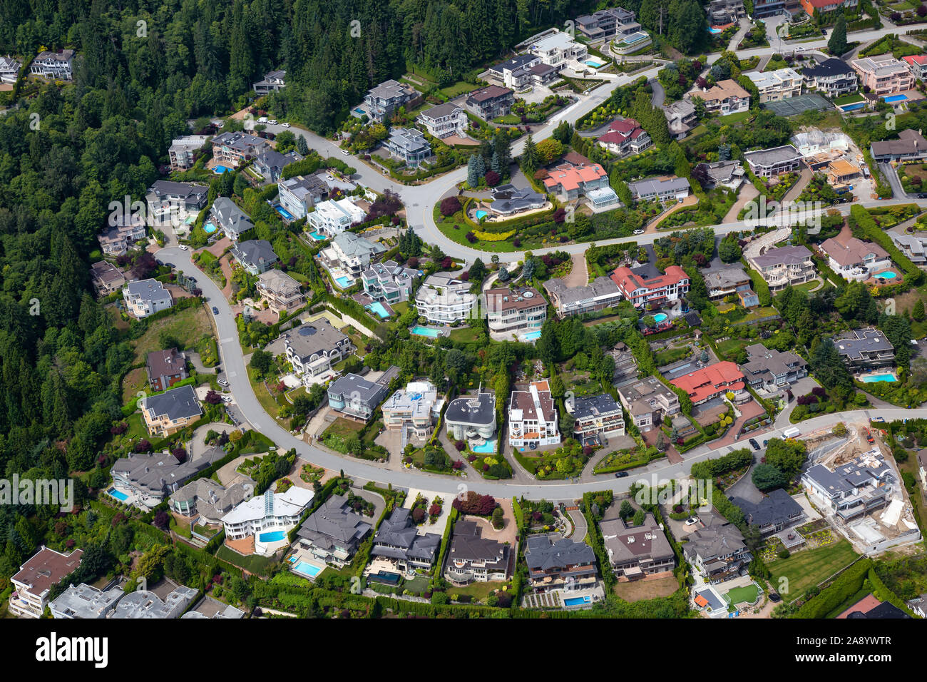 Aerial View of luxury homes in British Properties, West Vancouver, British Columbia, Canada. Taken during a sunny summer day. Stock Photo