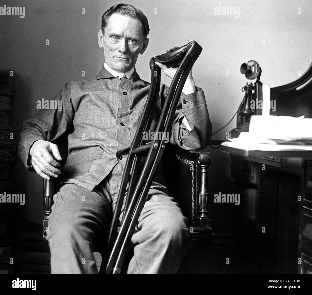 Early 1900s man with crutches hires stock photography and images Alamy