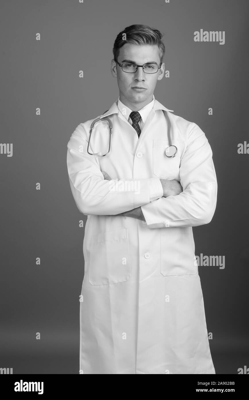Male doctor portrait arms crossed Black and White Stock Photos & Images ...