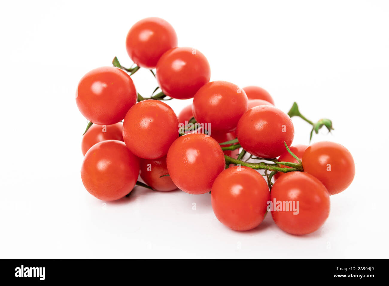 Cherry tomatoes isolated on white background Stock Photo - Alamy