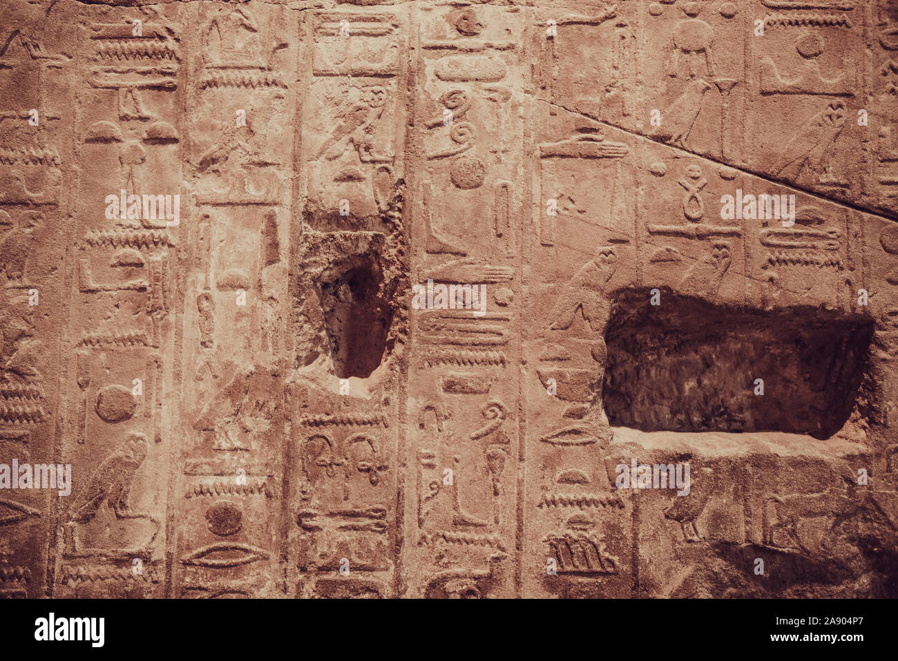 old egypt hieroglyphs carved on the stone Stock Photo - Alamy