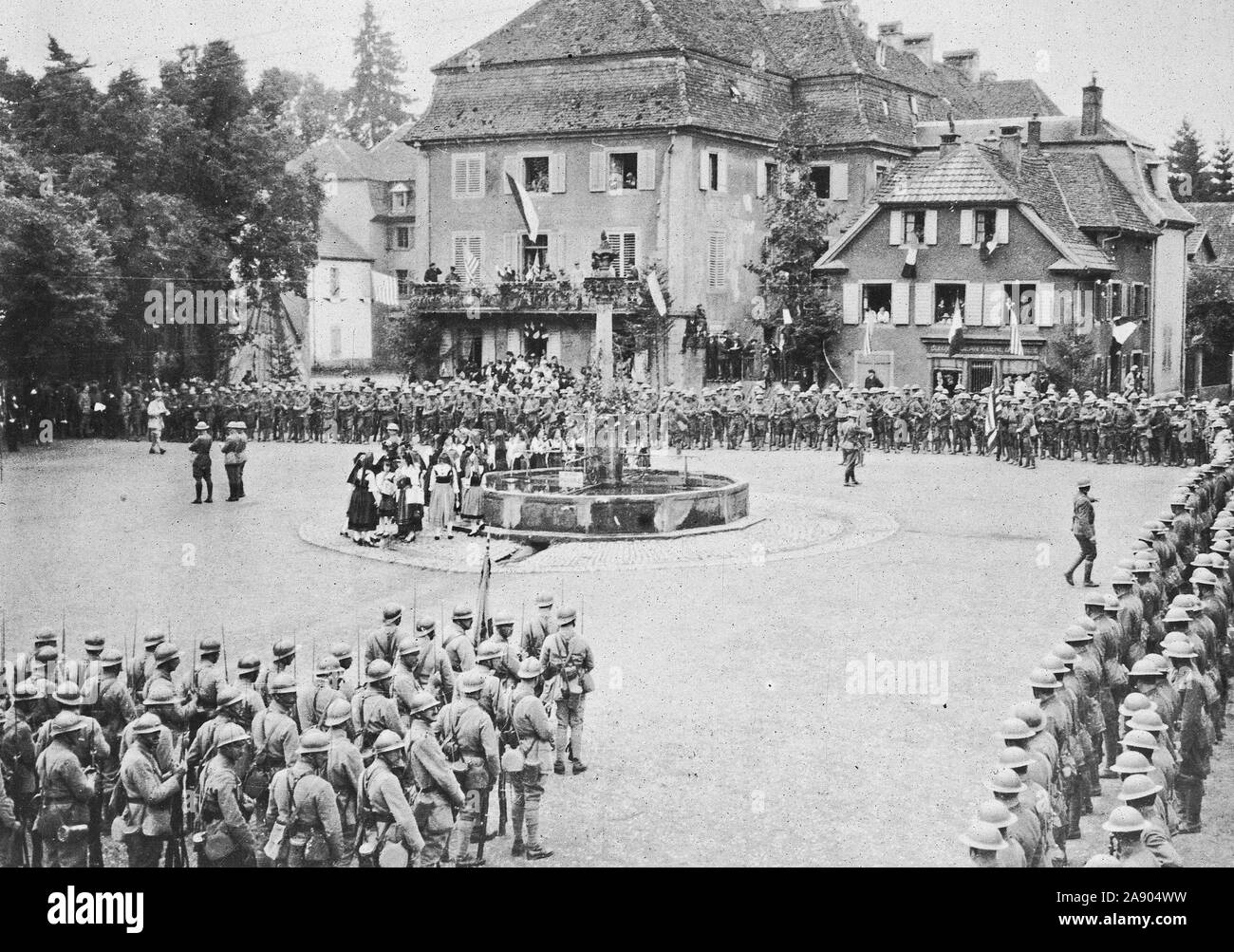 American Independence Day in Alsace. A scene on Independence Day in the Place de Yasseraux. American and French troo[s surround the square at which a patriotic service was held Stock Photo