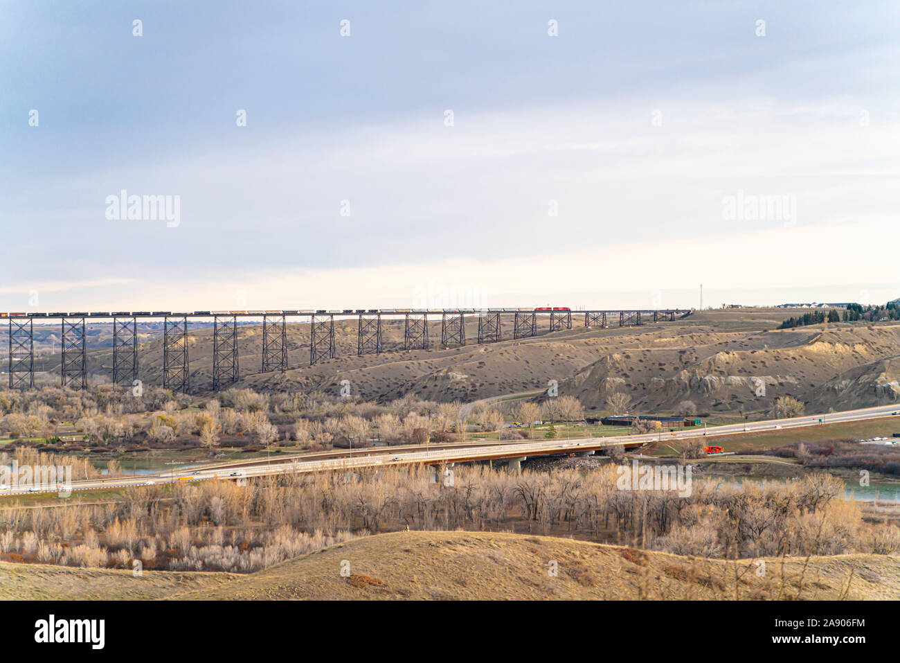 High Level Railway Bridge in Lethbridge with a train on top Stock Photo