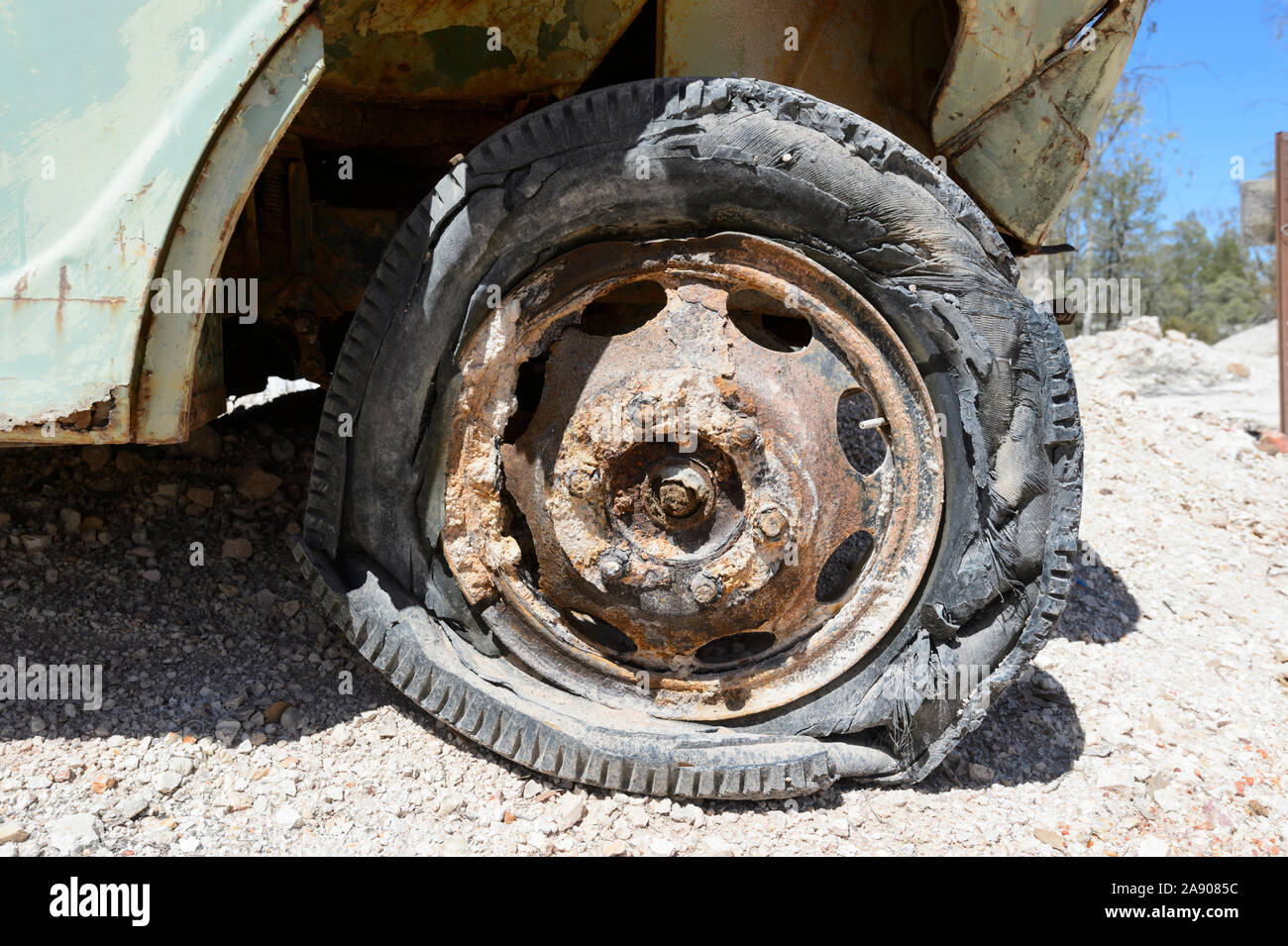 Old rusty and deflated truck tyre, Lightning Ridge, New South Wales, NSW, Australia Stock Photo