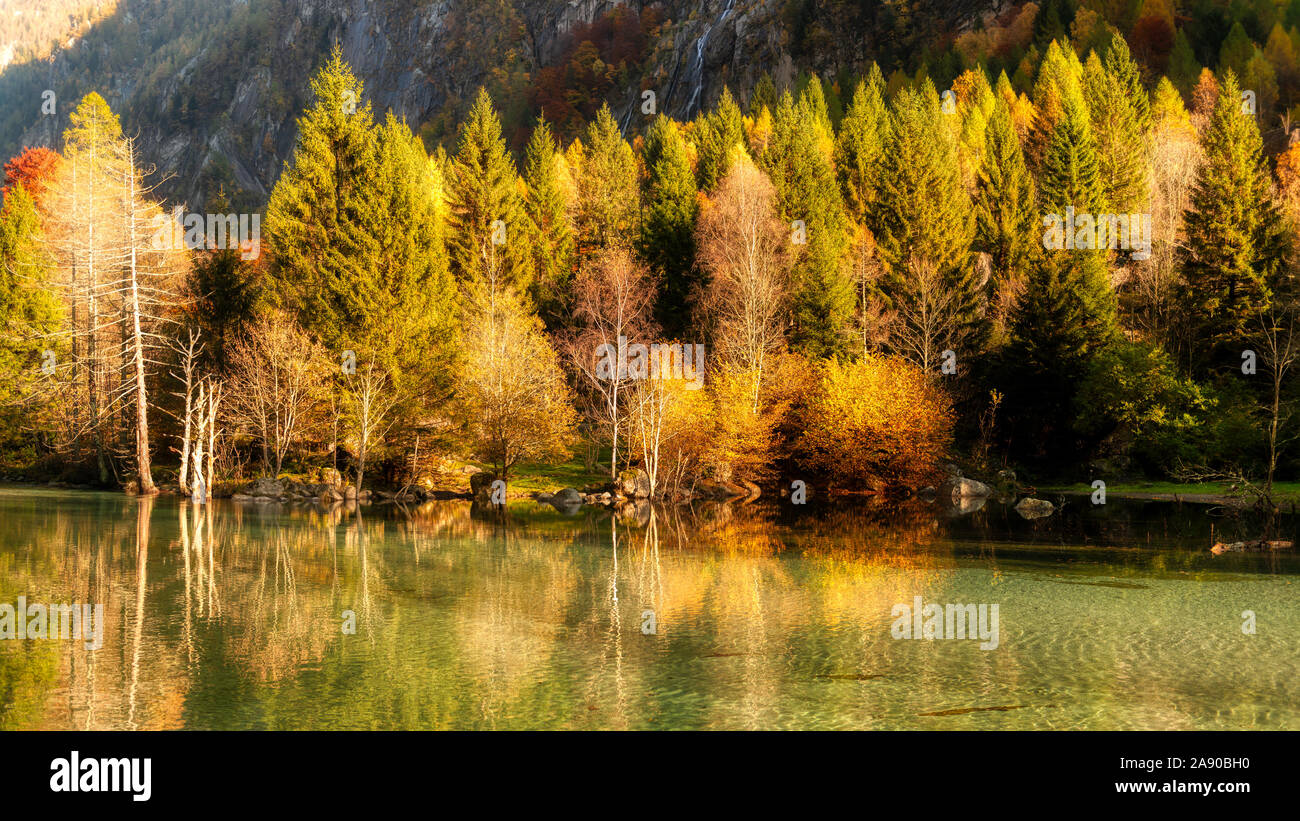 lake in the mountains in autumn season Stock Photo