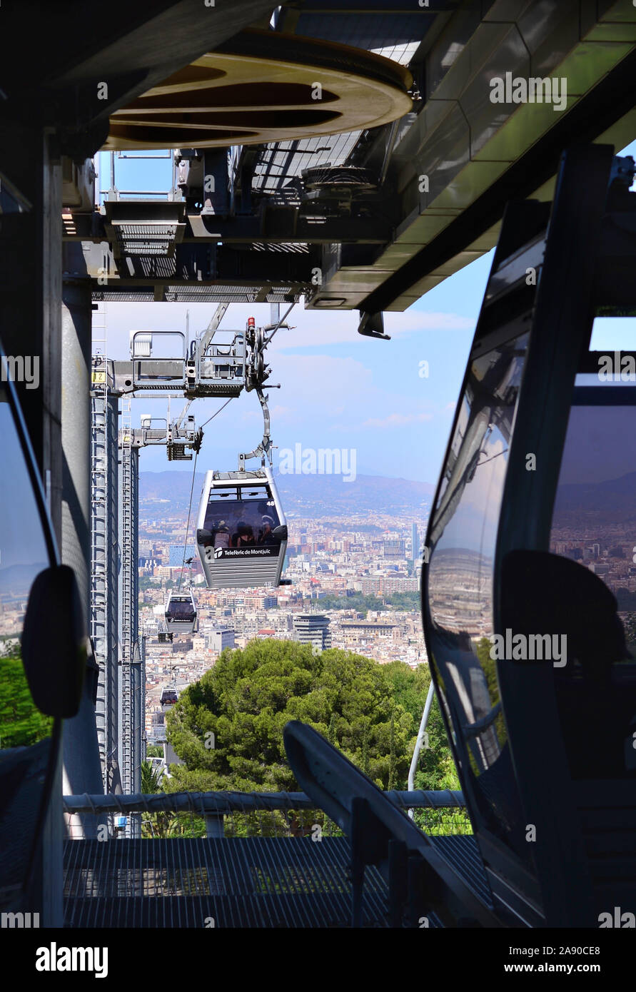 The Montjuic cable car at station Stock Photo - Alamy