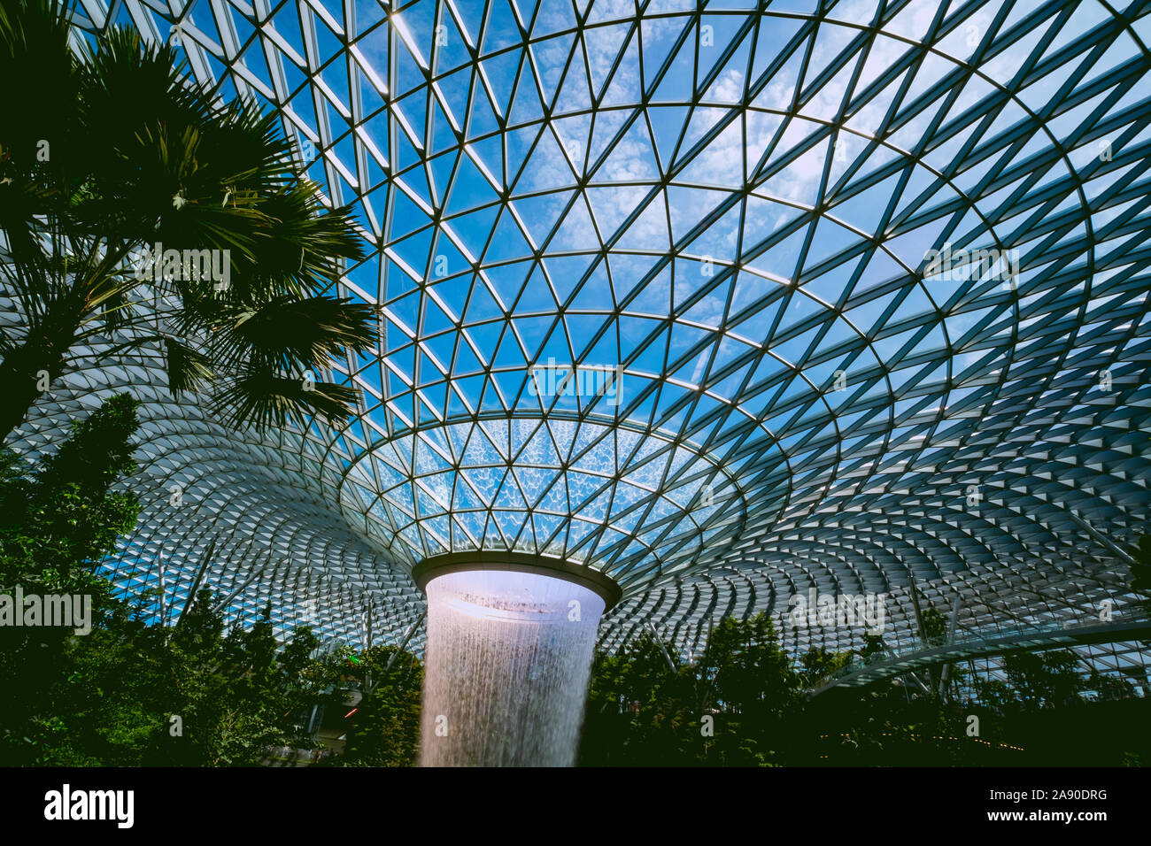 Roof glass panels are one of Jewel Changi Airport's architectural features, to allow day light transmission for energy savings. Stock Photo