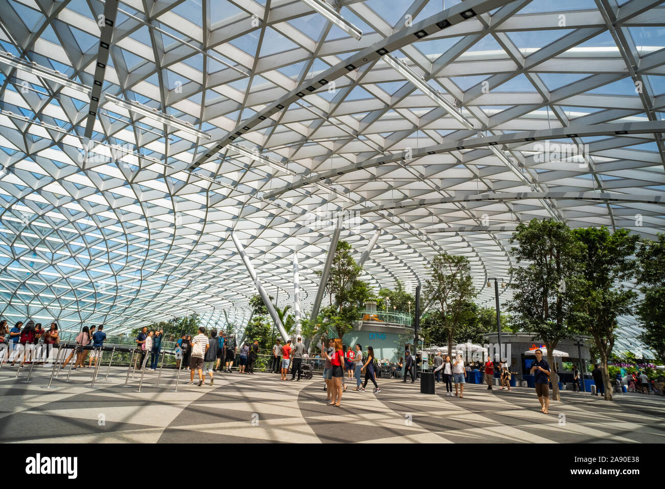 Wide angle view of the roof glass panels, one of Jewel Changi Airport's architectural features, to allow day light transmission for energy savings. Stock Photo