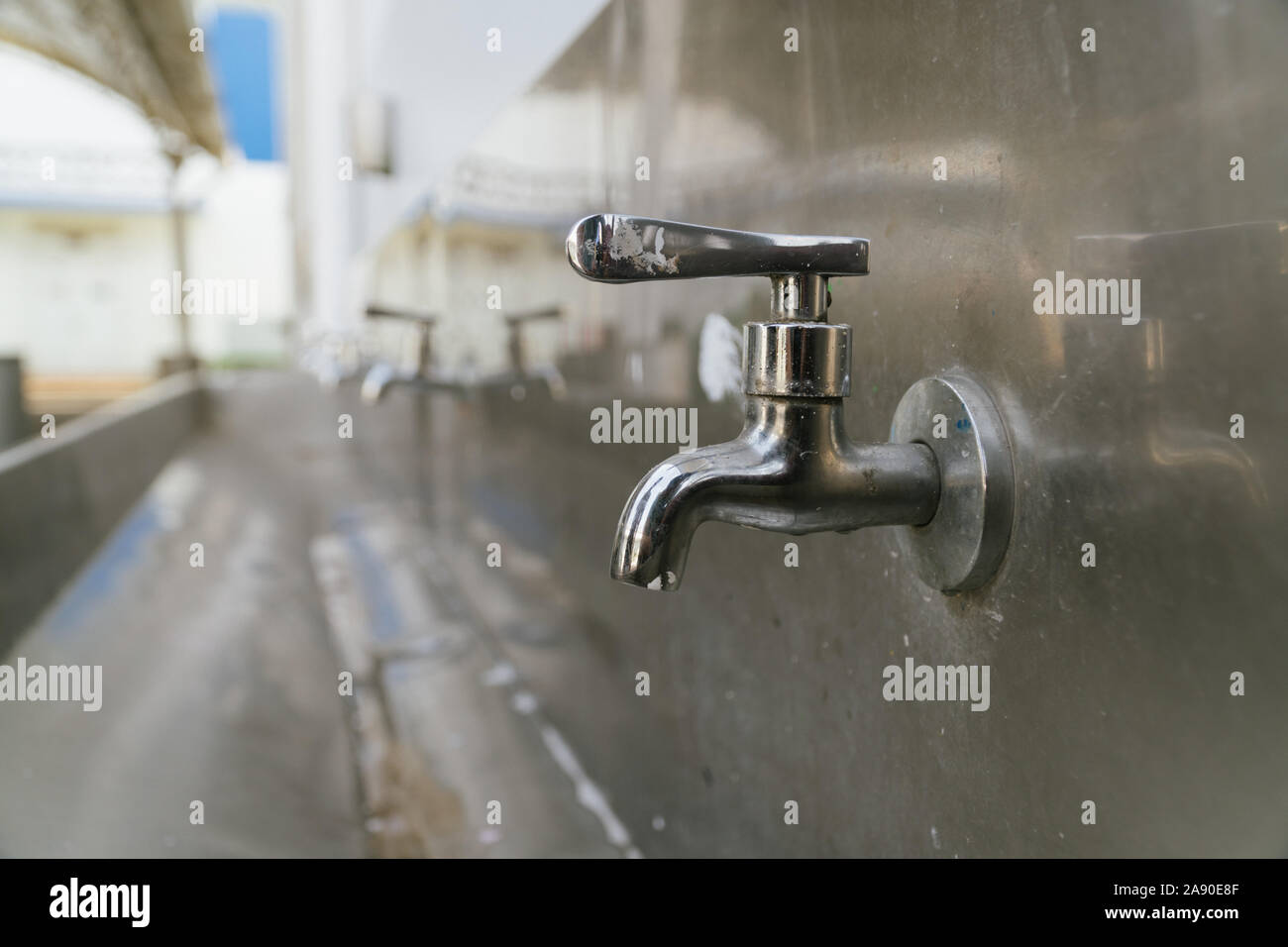 Outdoor water tap close up for drink in the primary school Stock Photo