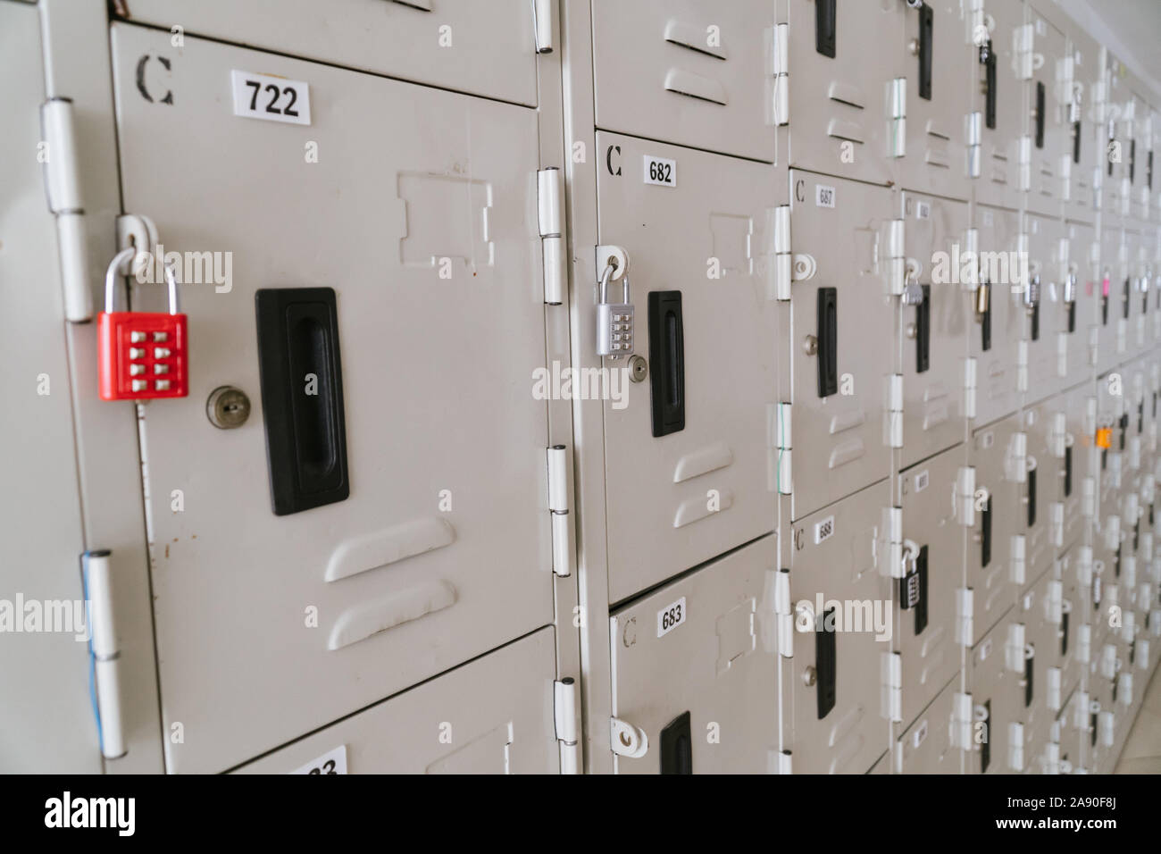 Line of lockers with the lock in the hallway of campus in primary school Stock Photo