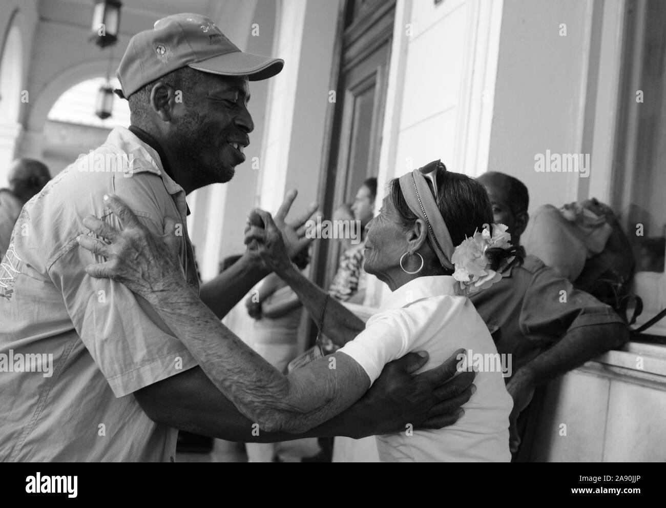 Cuba: Old people dancing on the street and main square of Santa Clara. Stock Photo