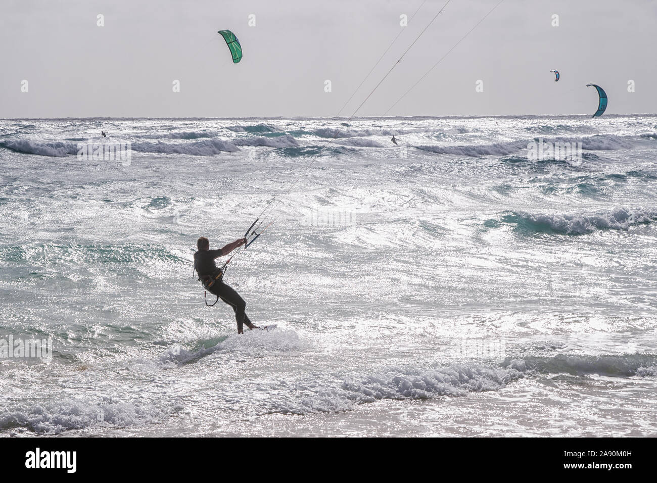 Kyte surf enthusiasts while practicing in Corralejo, Fuerteventura, Canary Islands, Spain Stock Photo