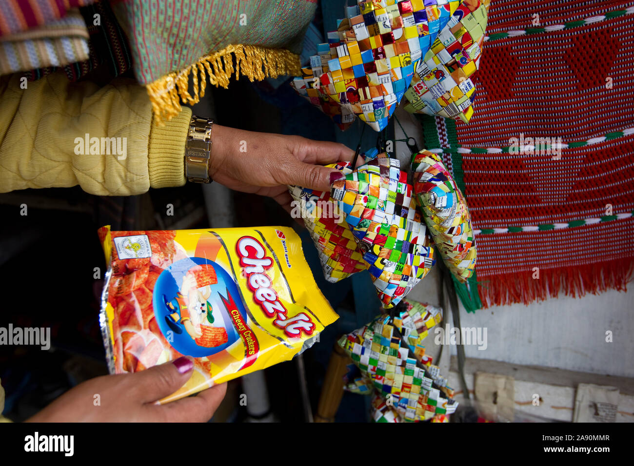Empty crisp packets recycled and made into small purses,Banaue,Luzon,Philippines Stock Photo