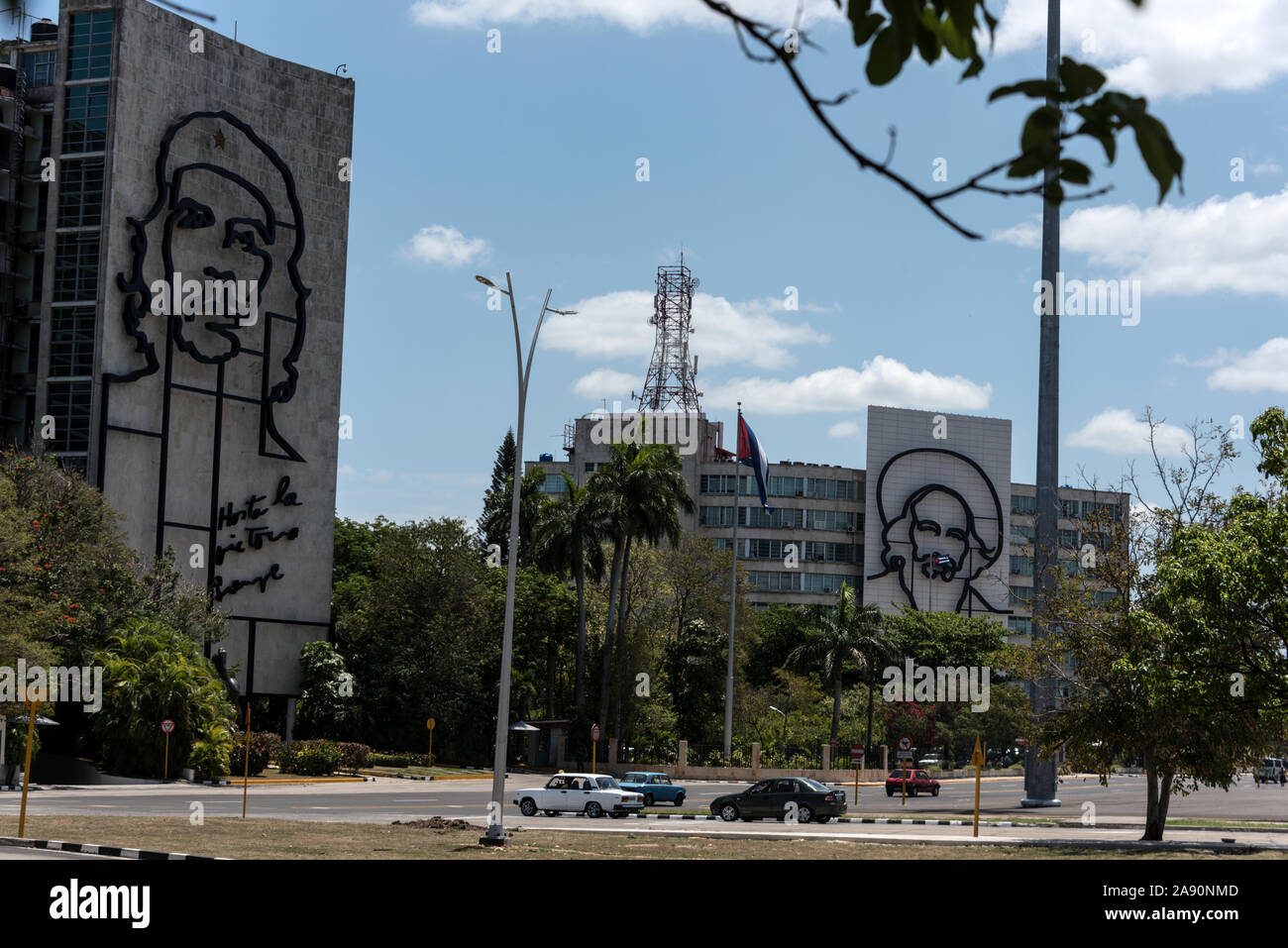 Adoring the walls of the Ministry of Interior and Ministry of Communications are  large portaits of the two leaders of the Cuban Revolution, Che Gueva Stock Photo