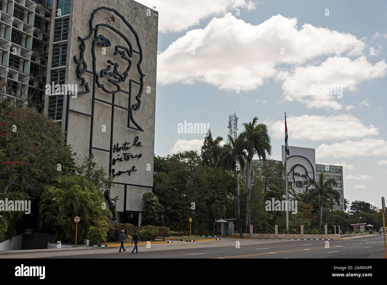 Adoring the walls of the Ministry of Interior and Ministry of Communications are  large portraits of the two leaders of the Cuban Revolution, Che Gueva Stock Photo