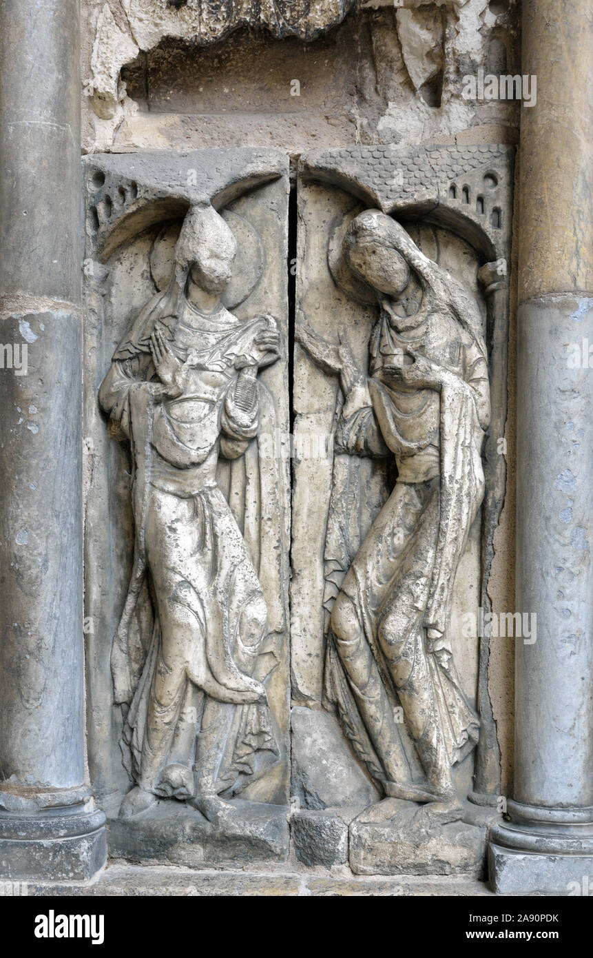 Bas-relief of facade in the Moissac Abbey decorated with sculptures of apostles and saints Stock Photo