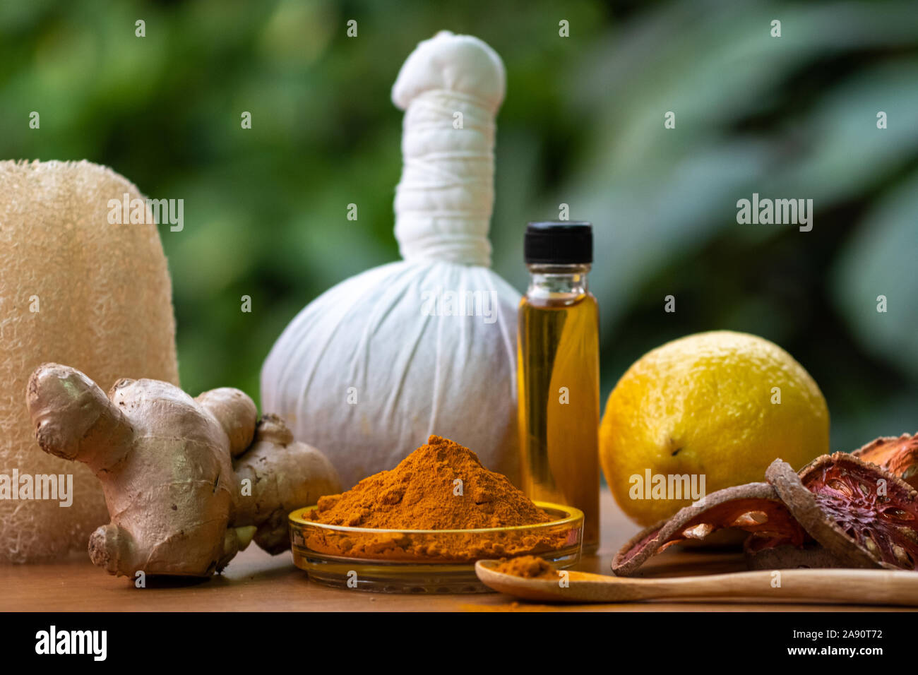 Natural medicine herb close-up.Healthcare spa ingredient such as lemon ginger turmeric massage oil organic aroma.Alternative medicine. Stock Photo