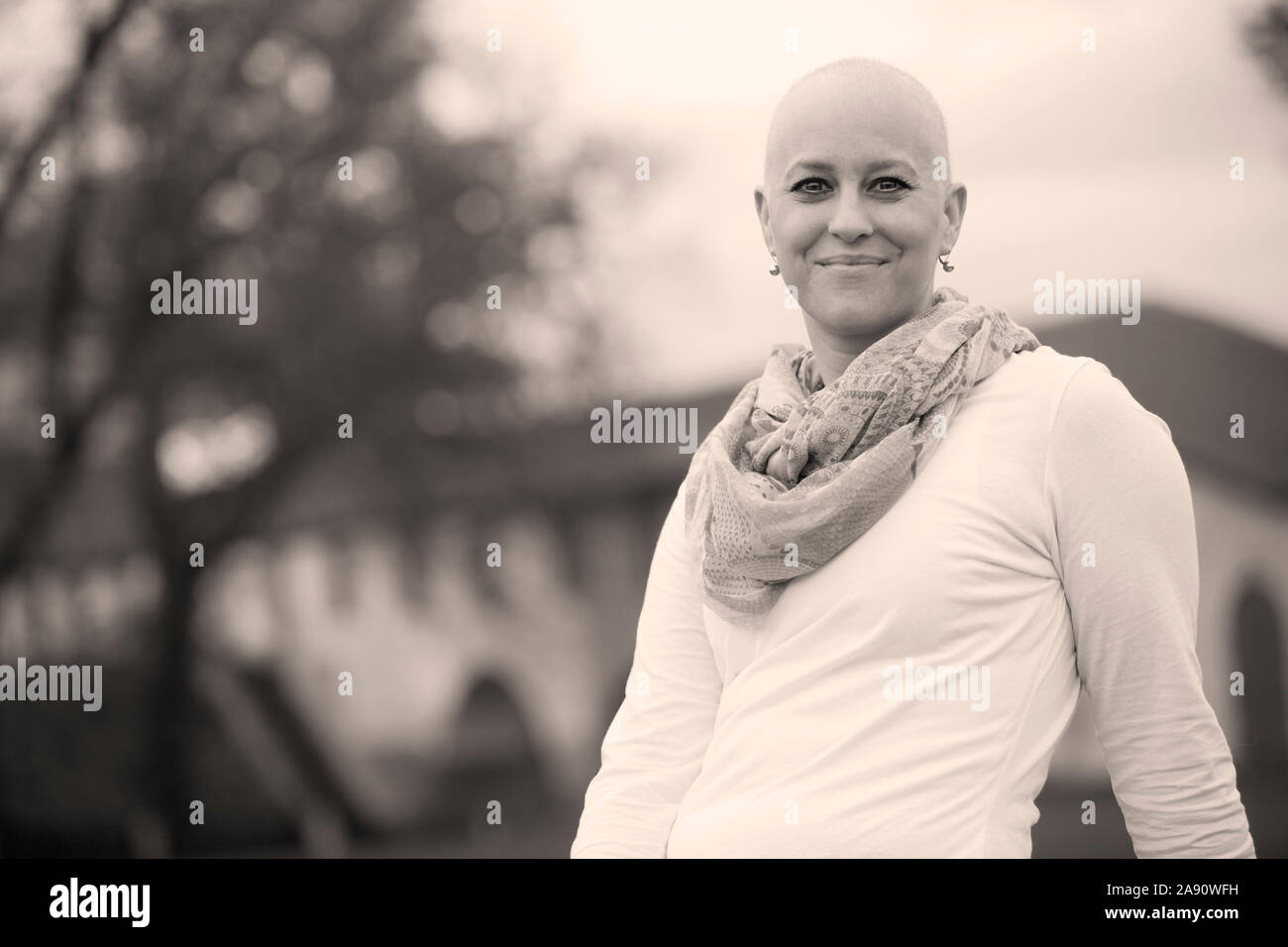 Portrait of a beautiful bold women during cancer treatment of chemotherapy. Stock Photo