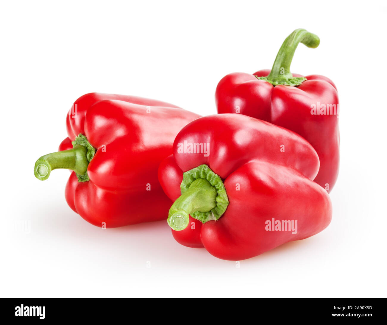 Red bell peppers isolated on white background Stock Photo - Alamy
