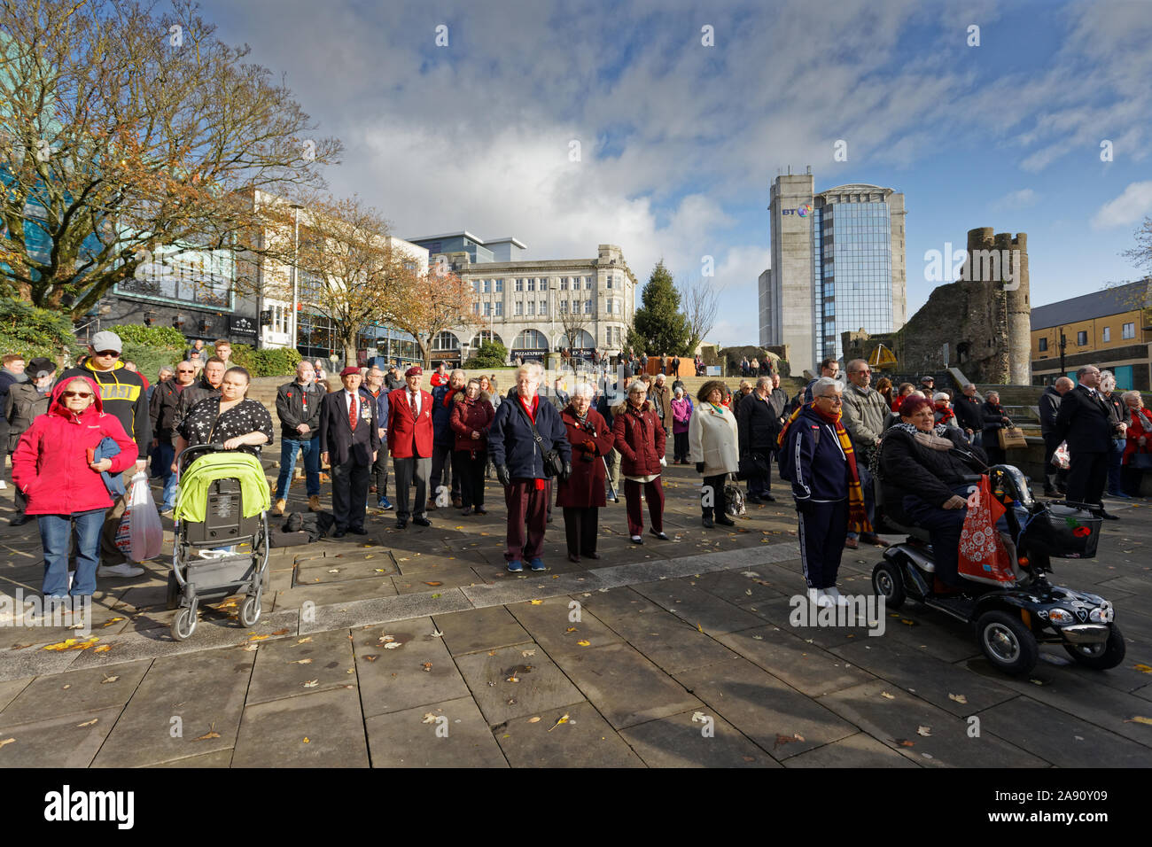 Swansea, UK. 11th Nov, 2019. Pictured: Members of the public, members of the armed forces and veterans gather at Castle Square Gardens in Swansea, Wales, UK. Monday 11 November 2019 Re: Armistice Day, a service to commemorate those who lost their lives in conflict has been held at Castle Square Gardens in Swansea, Wales, UK. Credit: ATHENA PICTURE AGENCY LTD/Alamy Live News Stock Photo