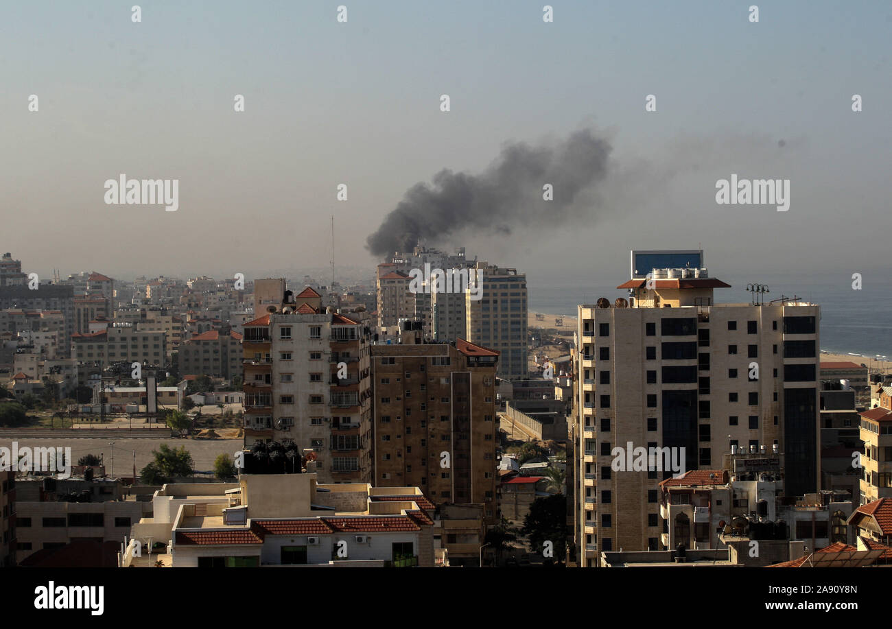 Gaza, Gaza. 12th Nov, 2019. Smoke billows in Gaza City following an Israeli strike on Tuesday on November 12, 2019. - Israel's military killed a commander for Palestinian militant group Islamic Jihad in a strike on his home in the Gaza Strip, prompting retaliatory rocket fire and fears of a severe escalation in violence. Photo by Ismael Mohamad/UPI. Credit: UPI/Alamy Live News Stock Photo