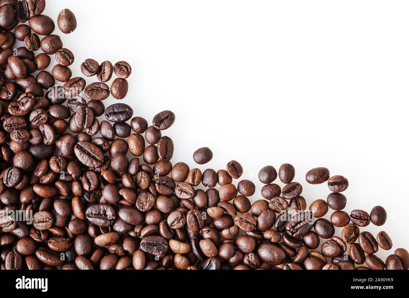 Roasted coffee beans on white background with copy space Stock Photo ...