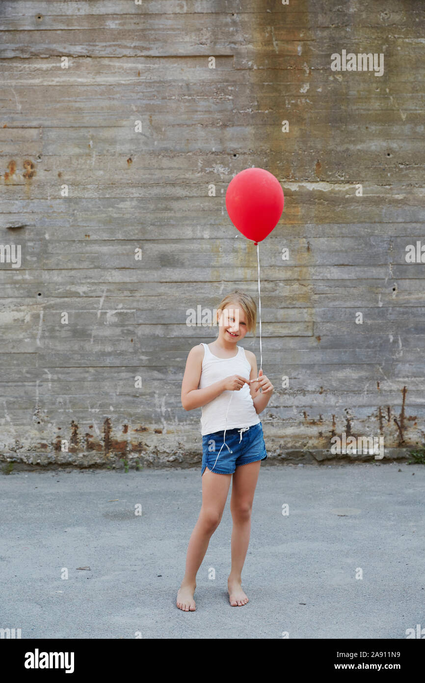 Girl with red balloon Stock Photo Alamy