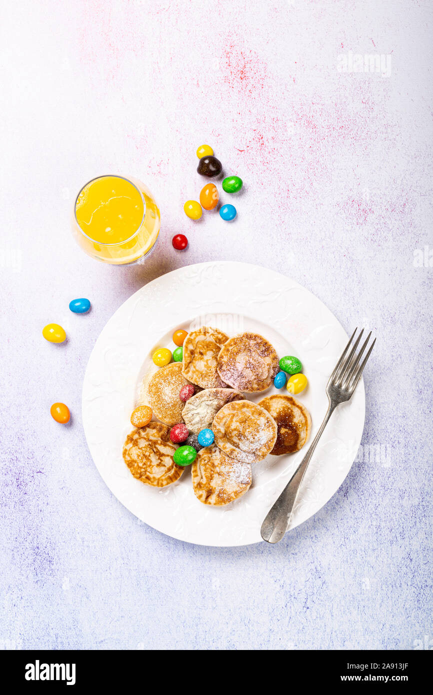 Dutch mini pancakes called poffertjes Stock Photo