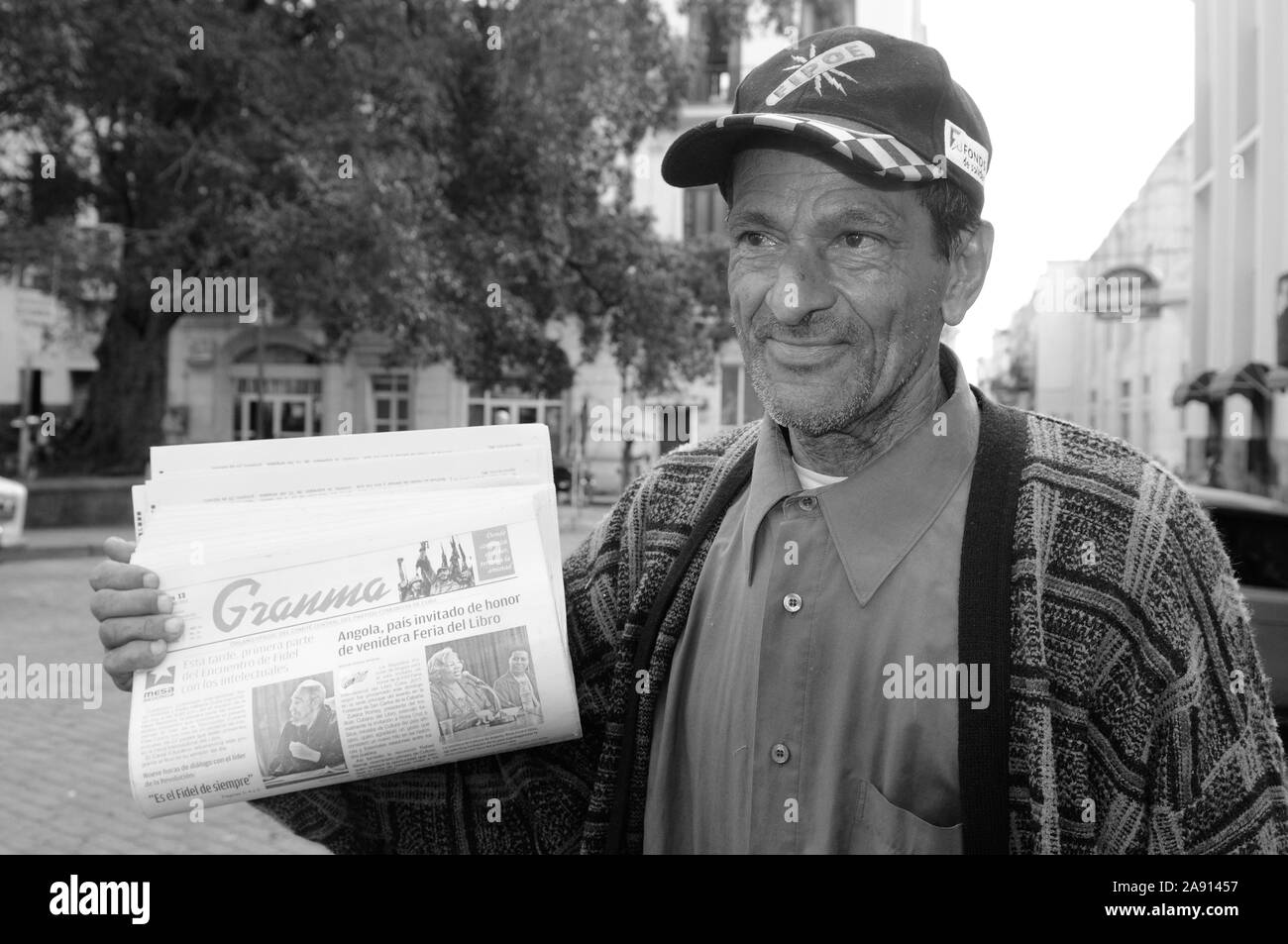 Cuban newspaper street seller in Havanna City: The Grandma is the official government paper. Stock Photo