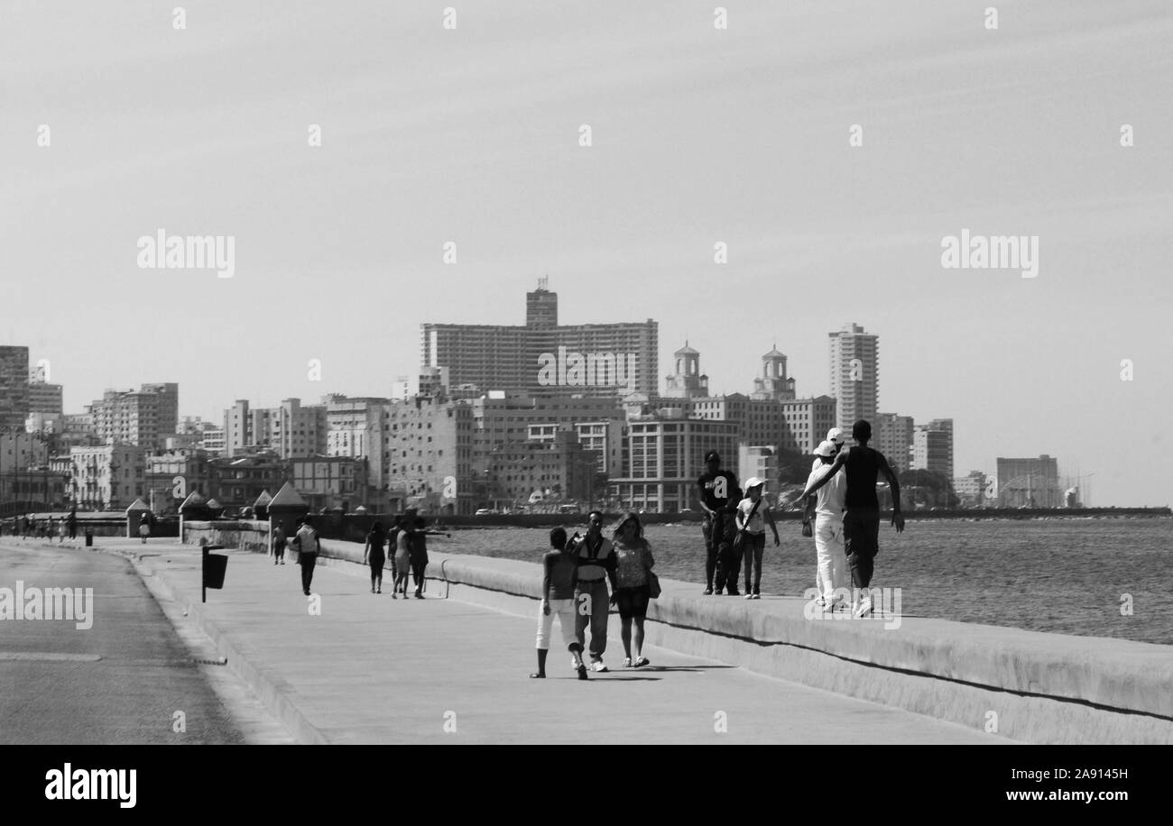 Cuban people at the Malecon in Havanna City. Stock Photo