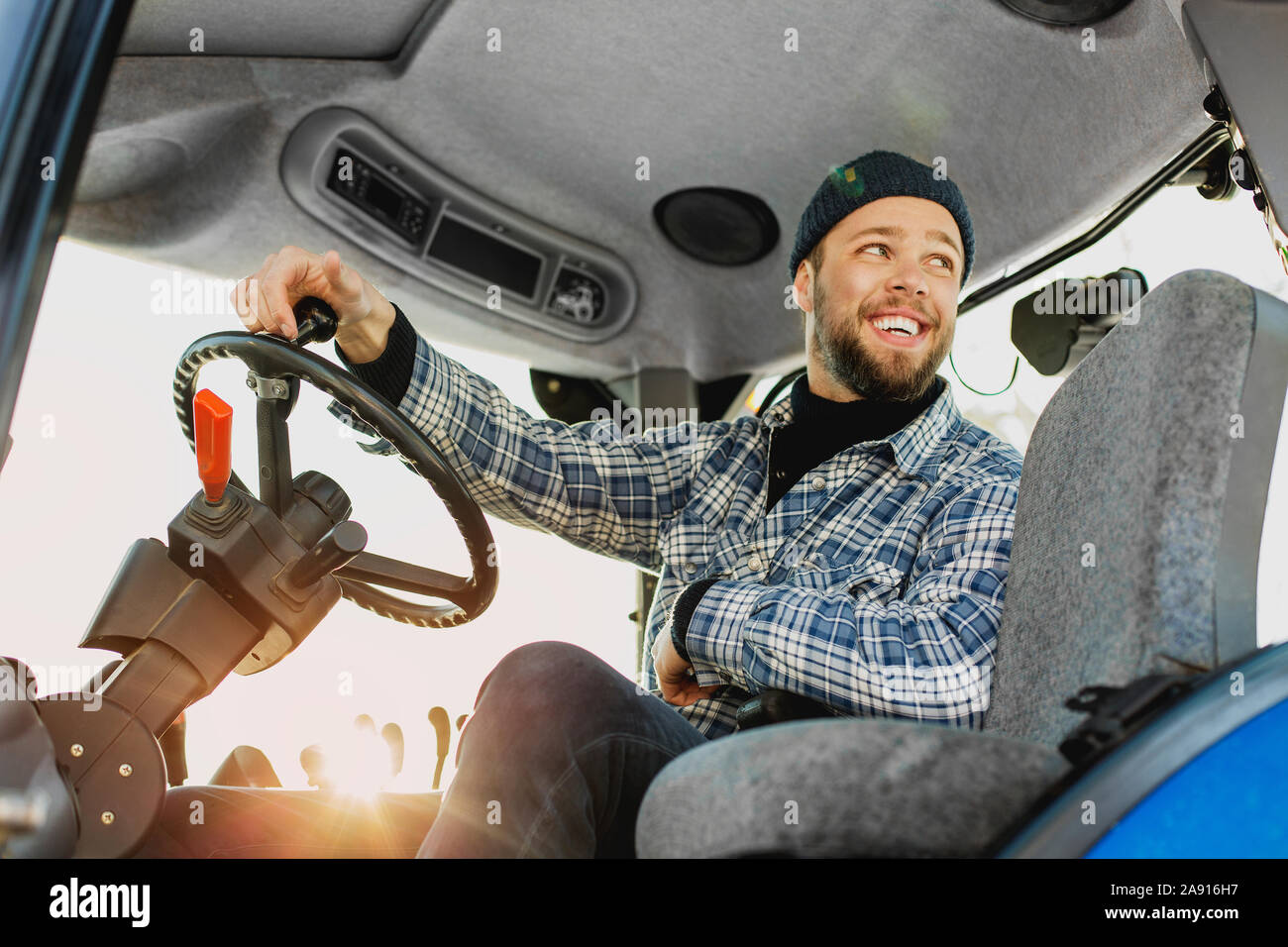 Smiling man driving Stock Photo