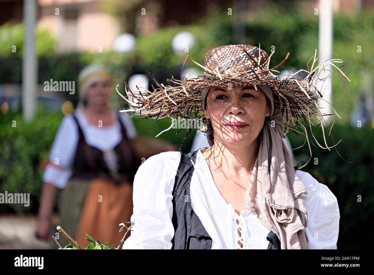 portrait of a woman at the costume parade for 'Invitas', an event for the tourism promotion of Sardinia Stock Photo