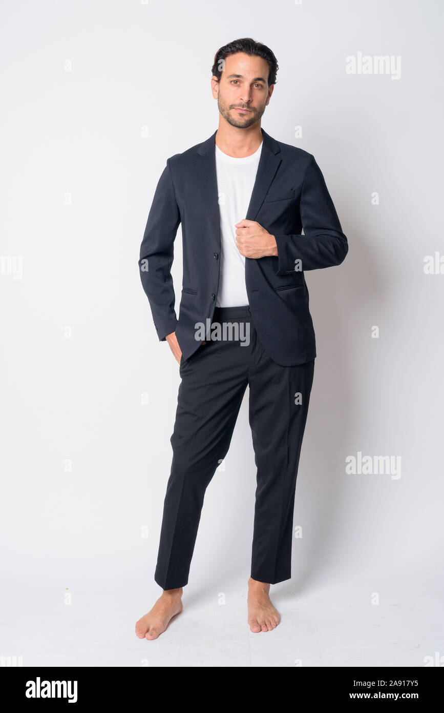 Full body shot of handsome Hispanic businessman Stock Photo - Alamy