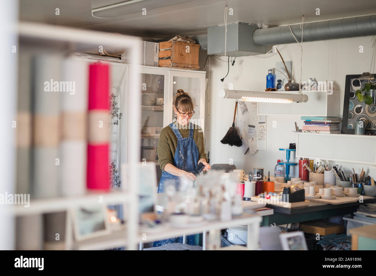 Potter in studio Stock Photo Alamy