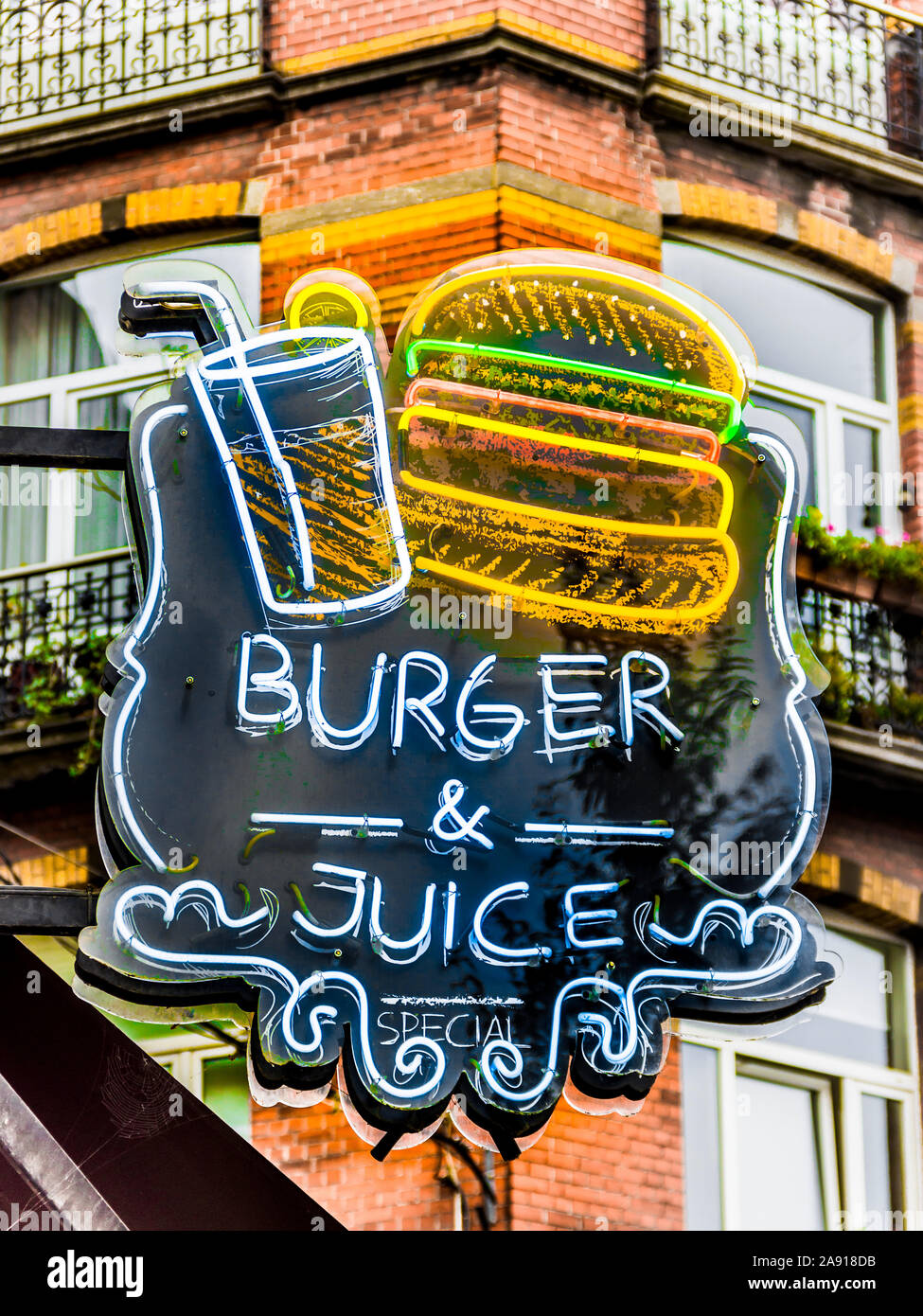 'Burger & Juice' neon restaurant sign, Brussels, Belgium. Stock Photo