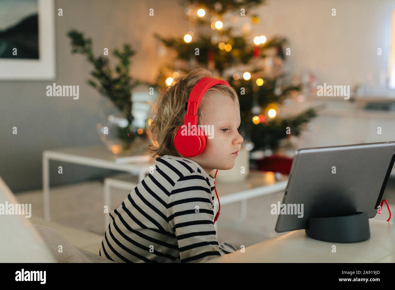 Boy using digital tablet Stock Photo