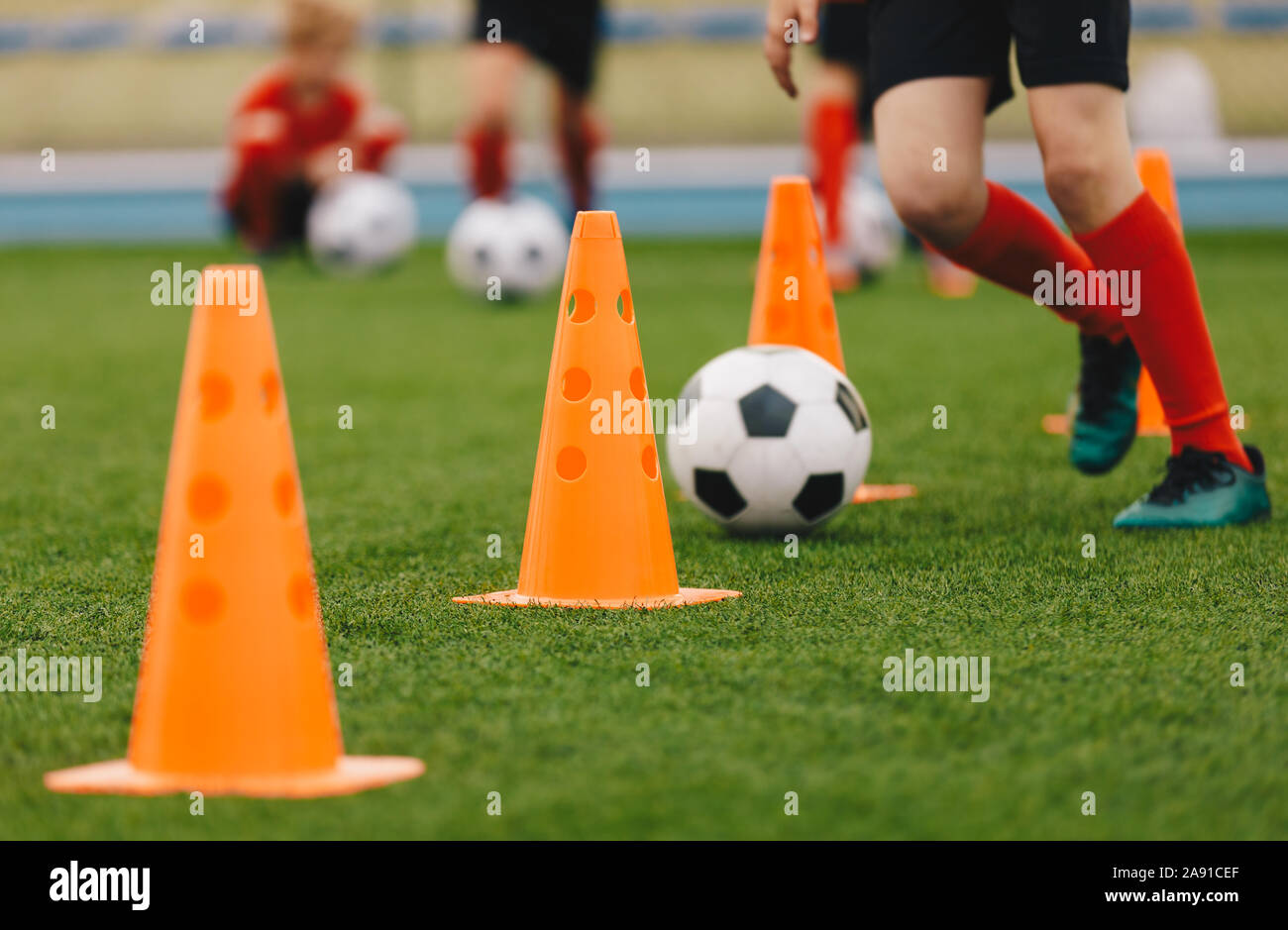 Soccer Training Drill. Football Player Running With Ball. Soccer