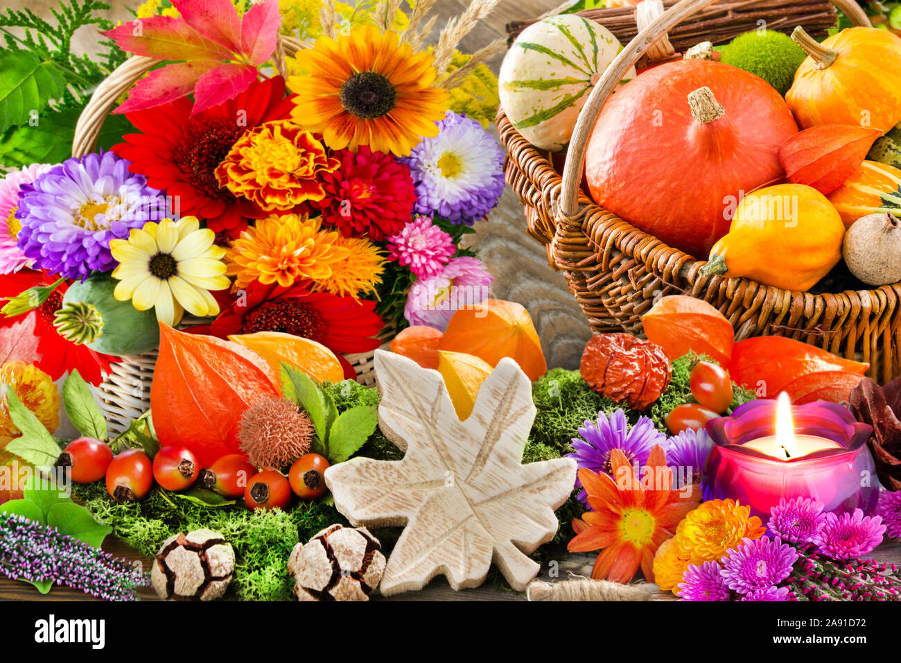 Autumn flowers and pumpkins with decorations background Stock Photo - Alamy