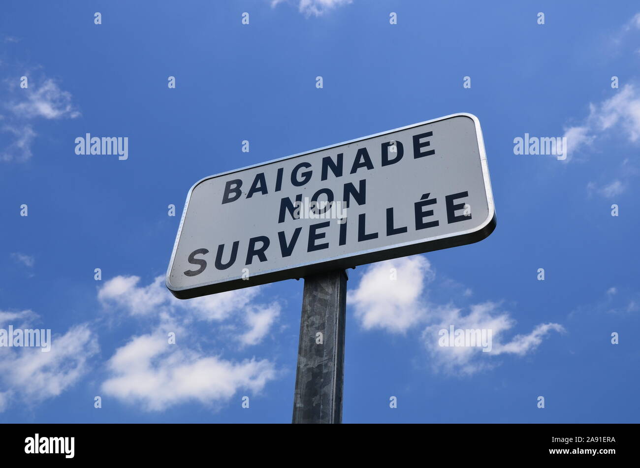 Unsupervised Swiming Sign Unsupervised bathing sign in French, Brittany Stock Photo - Alamy