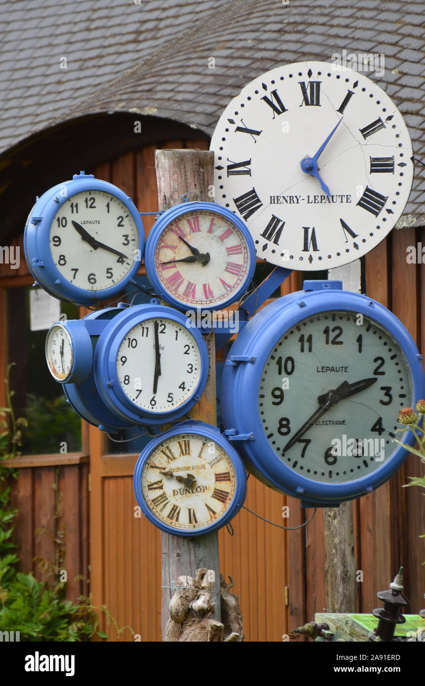 Collection of clocks, St Aignan, Brittany Stock Photo