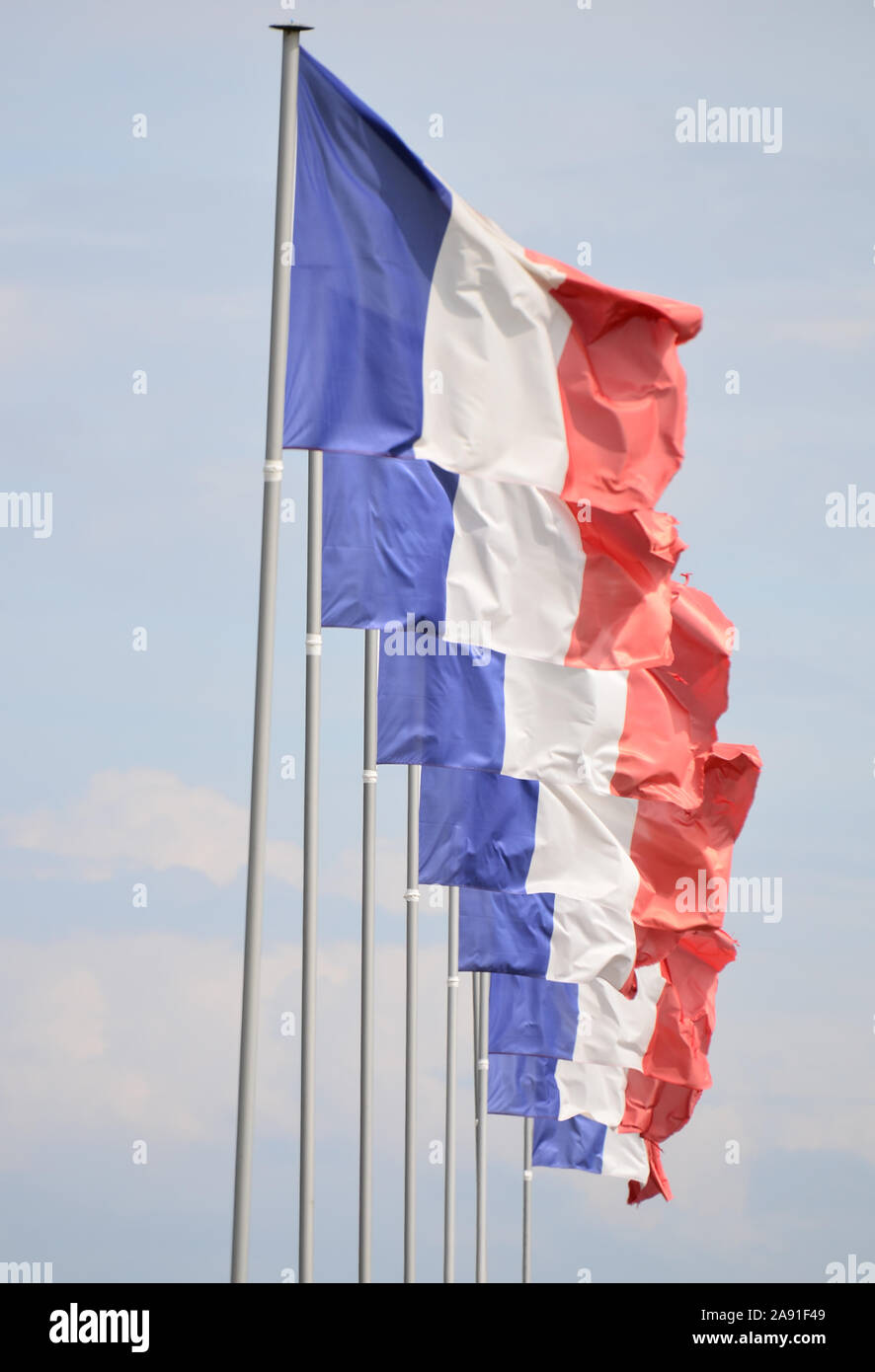 French flags, De Gaulle Monument, Normandy, France Stock Photo