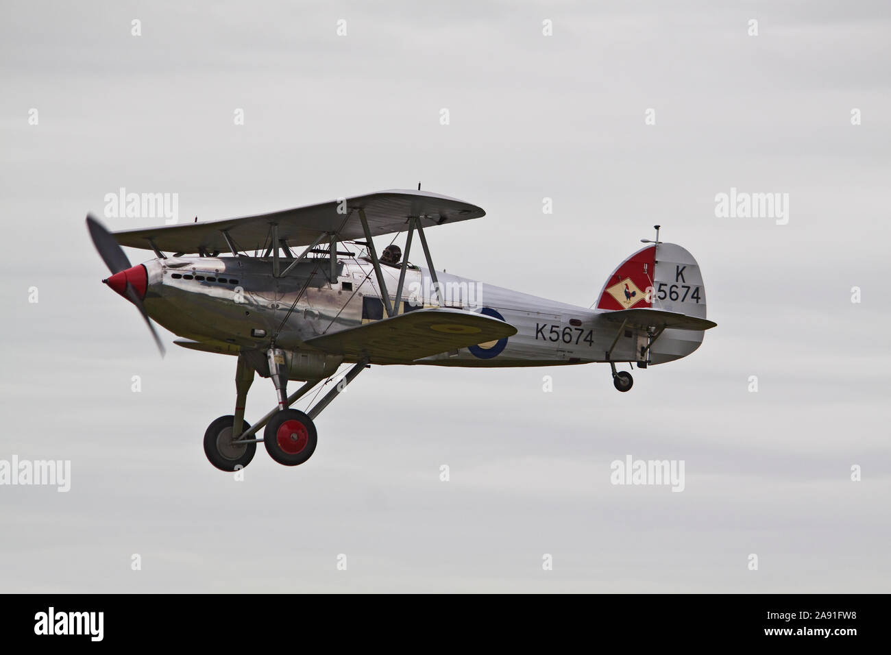 Vintage Biplane Hawker Fury in flight Stock Photo Alamy