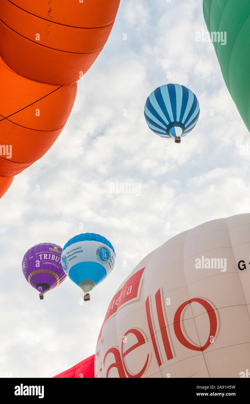 Mass ascent of hot air balloons from the launch site at Ashton Court Estate for the 2019 Bristol Balloon Fiesta Stock Photo