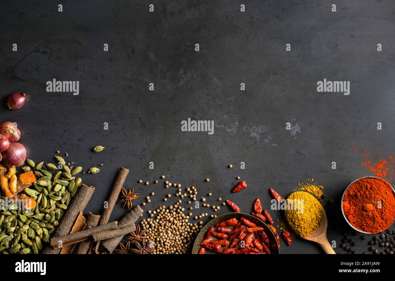 Spices on grey background Stock Photo